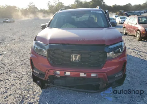 2023 Honda Passport Elite z USA, uszkodzony, nr VIN 5FNYF8H07PB027342